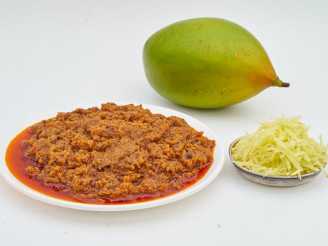 Mangai Thokku (Grated Cooked Mango Pickle) by Girijapaati